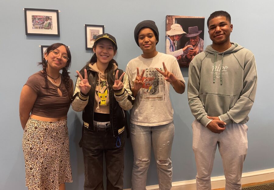 2 students stand next to each other facing the camera