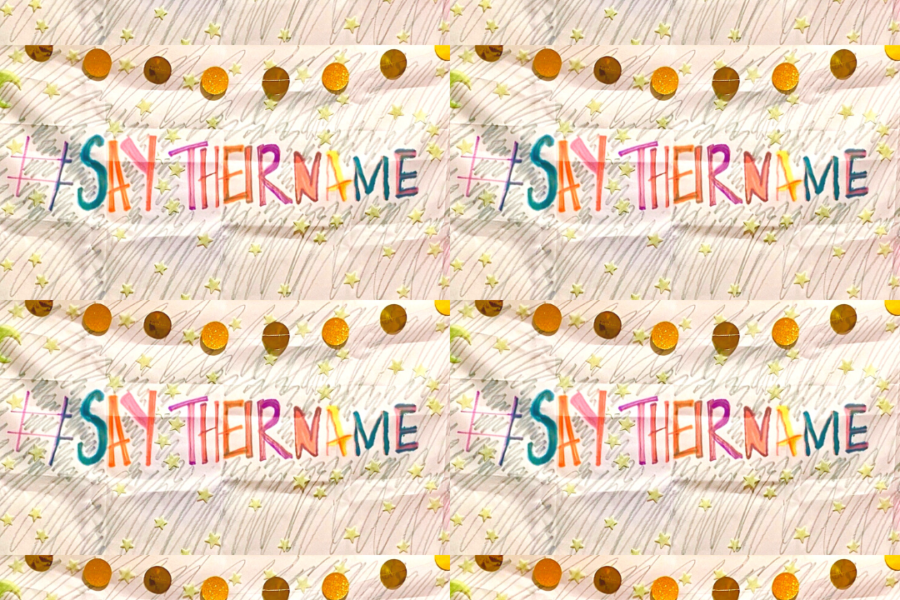 a banner hanging on a wall that features the hashtag #saytheirname